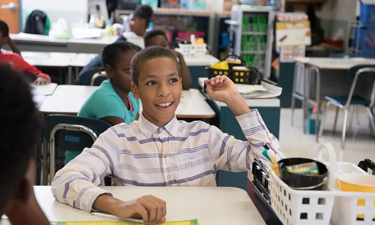 Students collaborating in a JA classroom