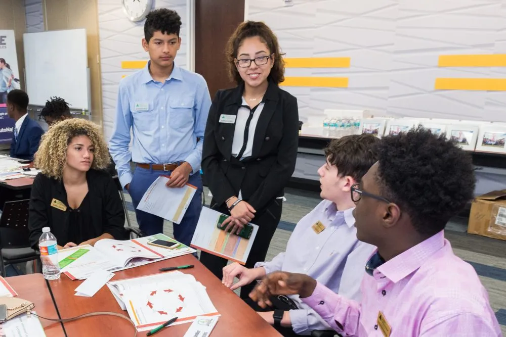 A diverse group of students smiling together